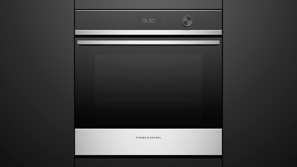 Built-in Convection Oven Set into Black Cabinetry.